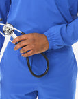 Men's Long Sleeve Scrub Top with Two Chest Pockets Royal Blue Closeup of Elastic Arm Wrist Cuff