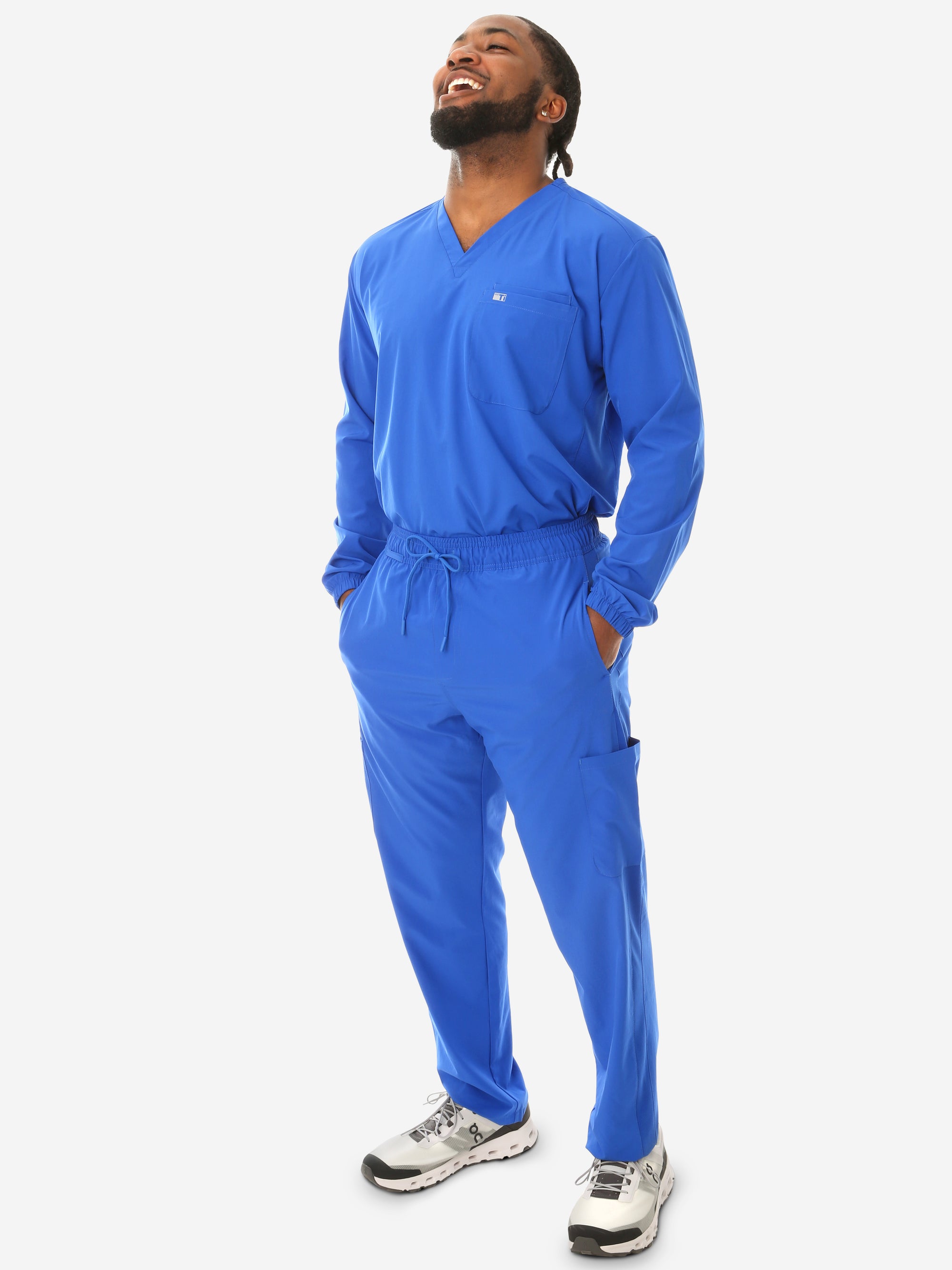 Men's Long Sleeve Scrub Top with Two Chest Pockets Royal Blue Full Body Front View with 9-Pocket Pants