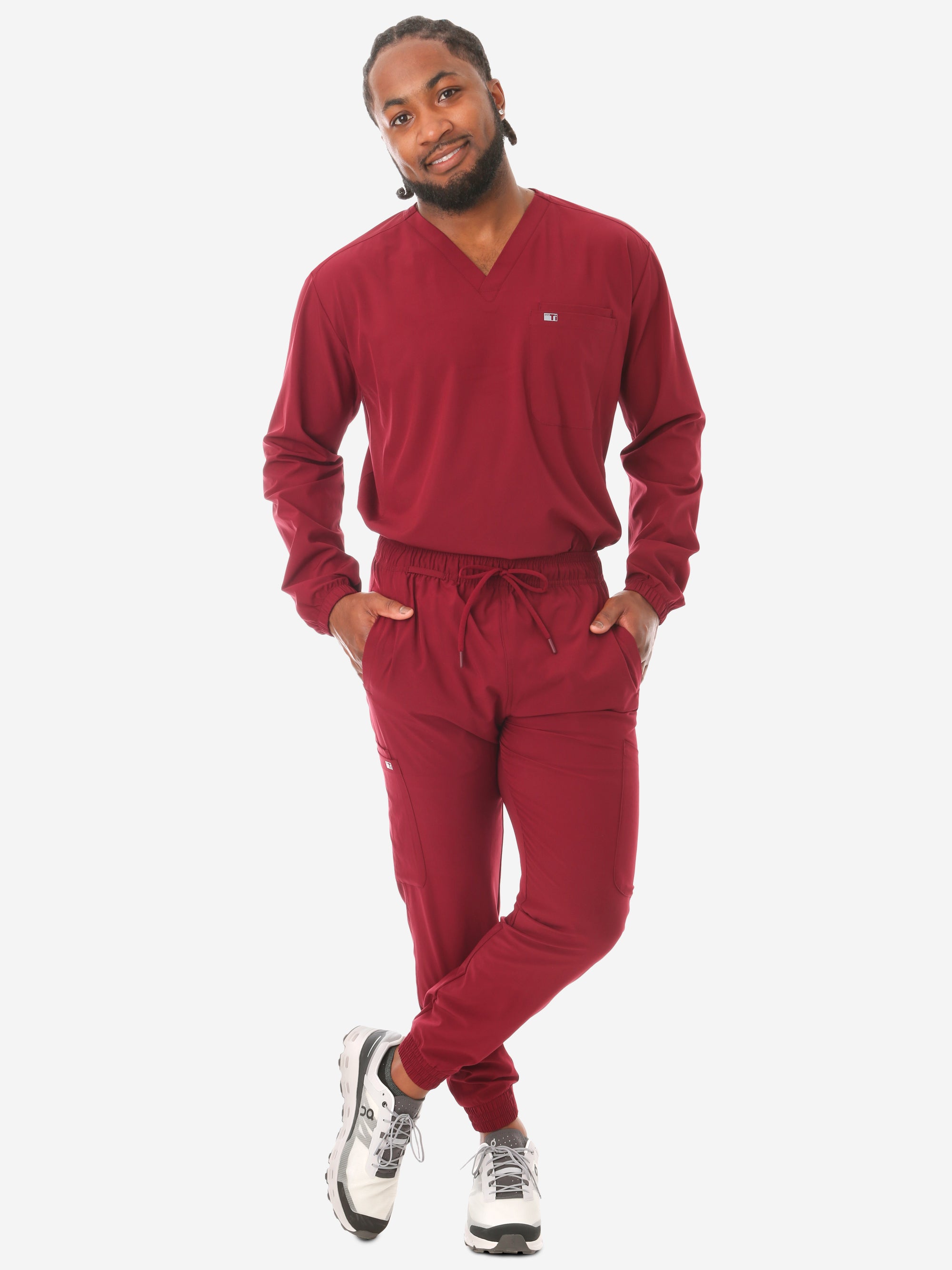 Men's Long Sleeve Scrub Top with Two Chest Pockets Bold Burgundy Full Body Front View with Joggers Scrub Pants