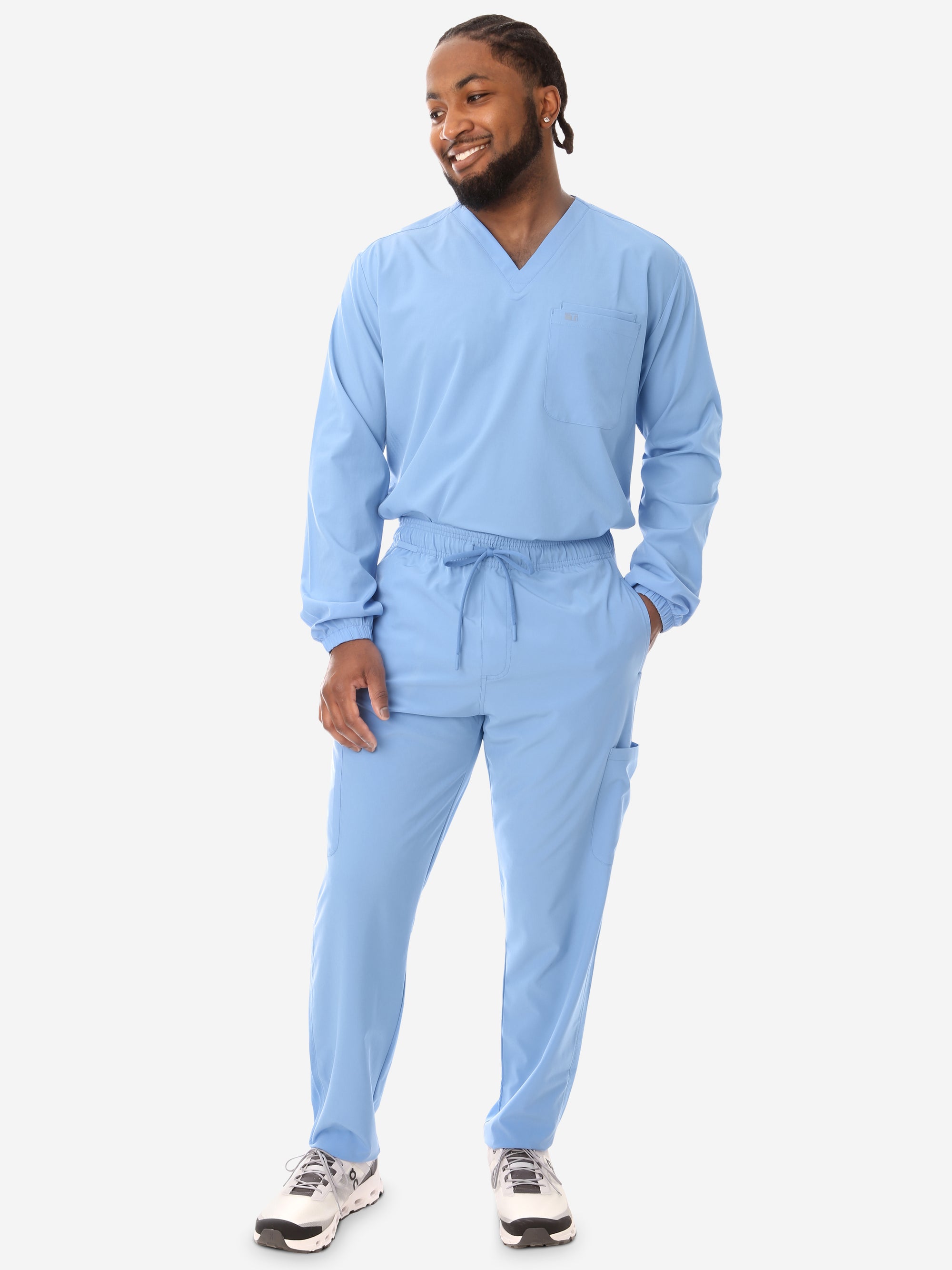 Men's Long Sleeve Scrub Top with Two Chest Pockets Ceil Blue Full Body Front View with 9-Pocket Pants