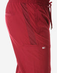 TiScrubs Bold Burgundy Men's 9-Pocket Scrub Pants Closeup Mesh Stripe and Cargo Pocket Side View