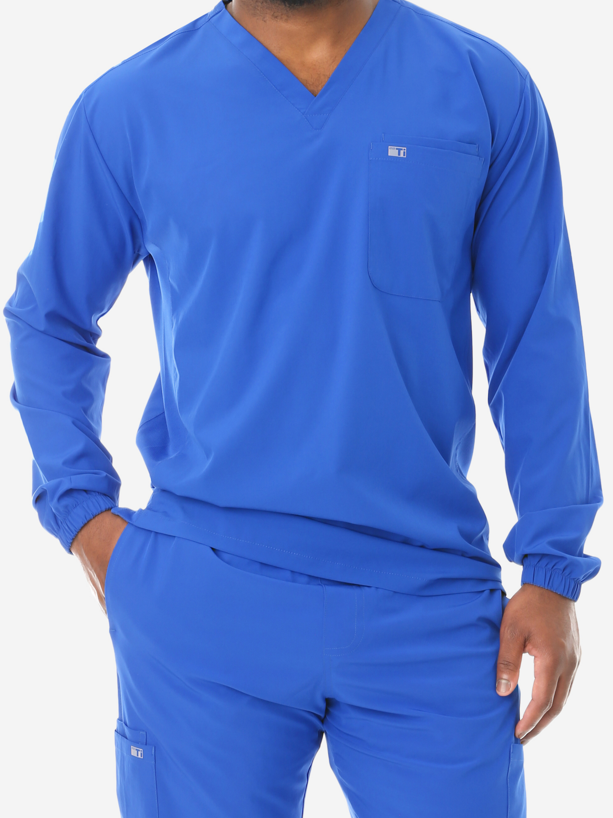 Man Wearing Men’s Performance Scrub Top – with an Athletic Fit