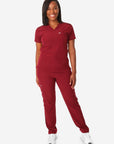 TiScrubs Women's Stretch Bold Burgundy One-Pocket Tuckable Scrub Top and 9-Pocket Pants Untucked Full Body Front