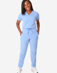 TiScrubs Women's Stretch Ceil Blue One-Pocket Tuckable Scrub Top and 9-Pocket Pants Tucked Full Body Front
