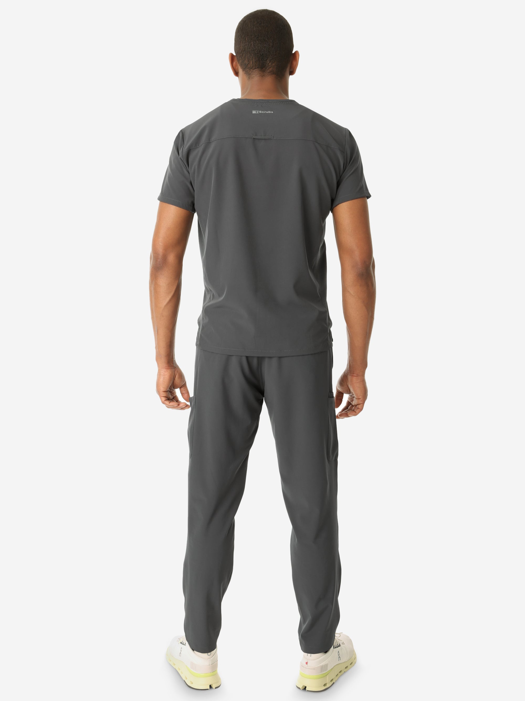 Men's Double Pocket Scrub Top Untucked Charcoal Gray Full Body Back View with 9-Pocket Pants