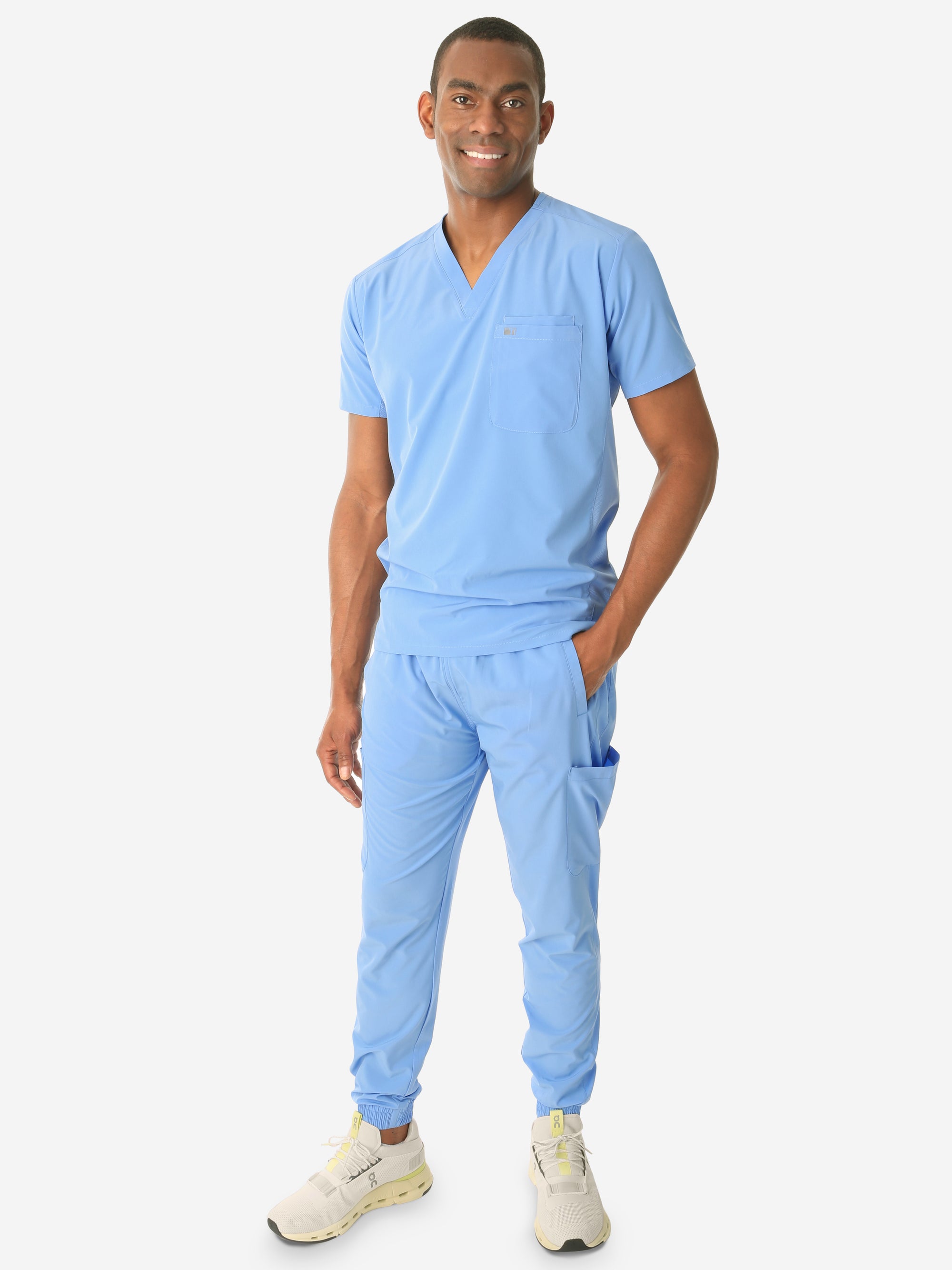 TiScrubs Men's Ceil Blue Double-Pocket Scrub Top Untucked and Joggers Full Body Front