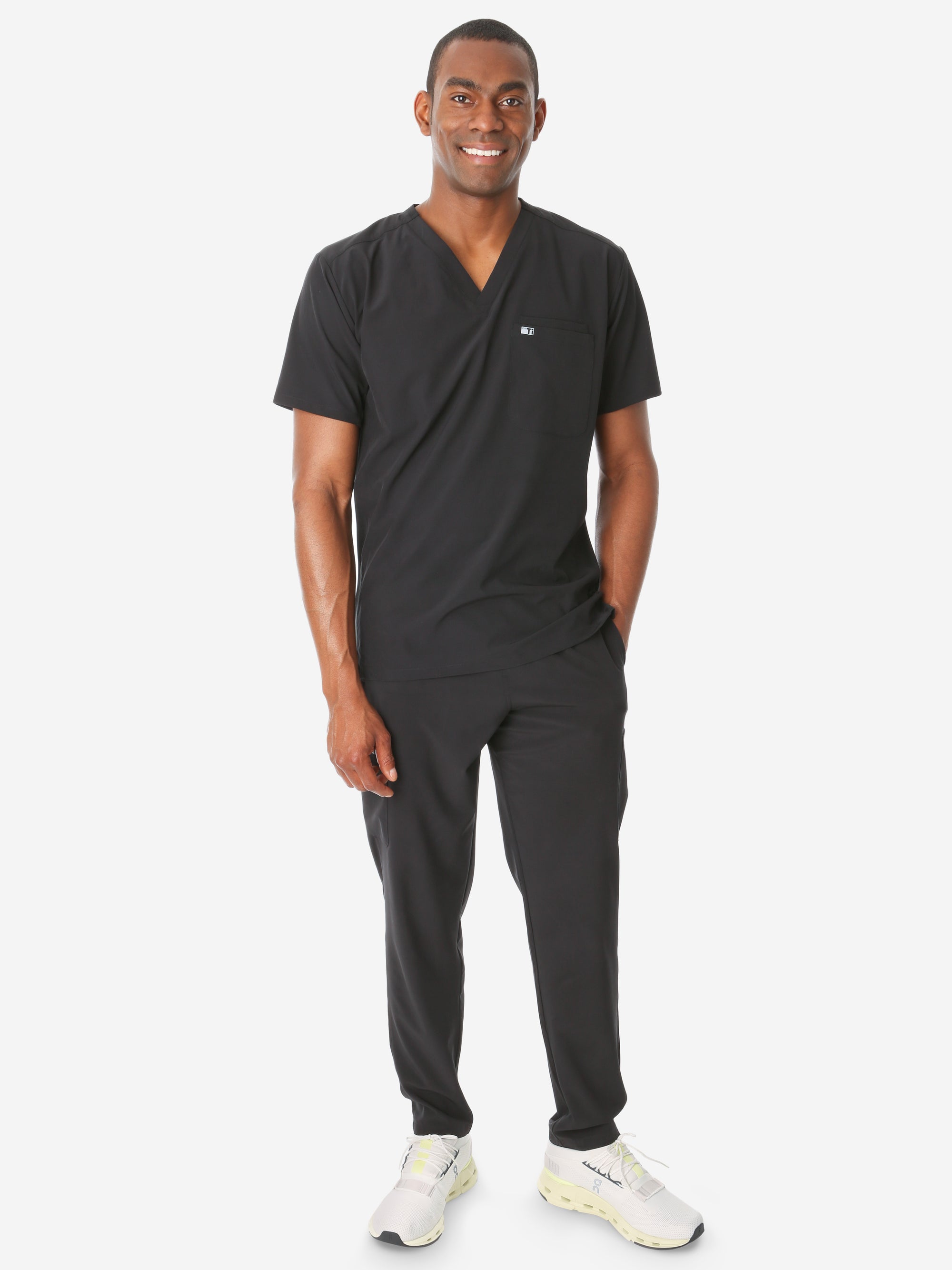 TiScrubs Men's Real Black Double-Pocket Scrub Top Untucked and 9-Pocket Full Body Front