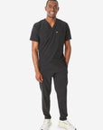 TiScrubs Men's Real Black Double-Pocket Scrub Top Untucked and 9-Pocket Full Body Front