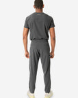 Men's Double-Pocket Scrub Top Charcoal Gray Tucked with 9-Pocket Scrub Pants Back View