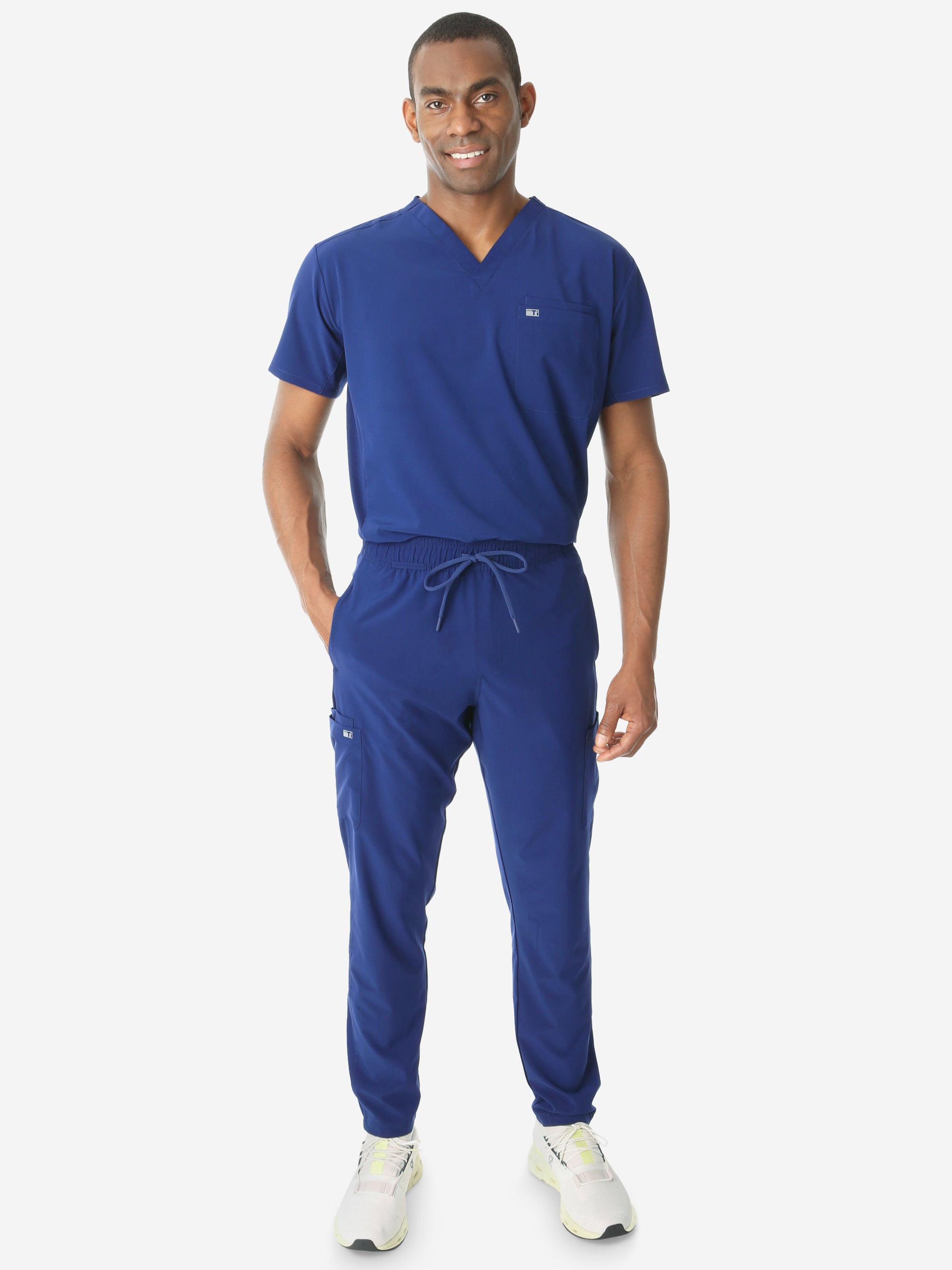 Men's Double-Pocket Scrub Top Navy Blue Tucked Front View