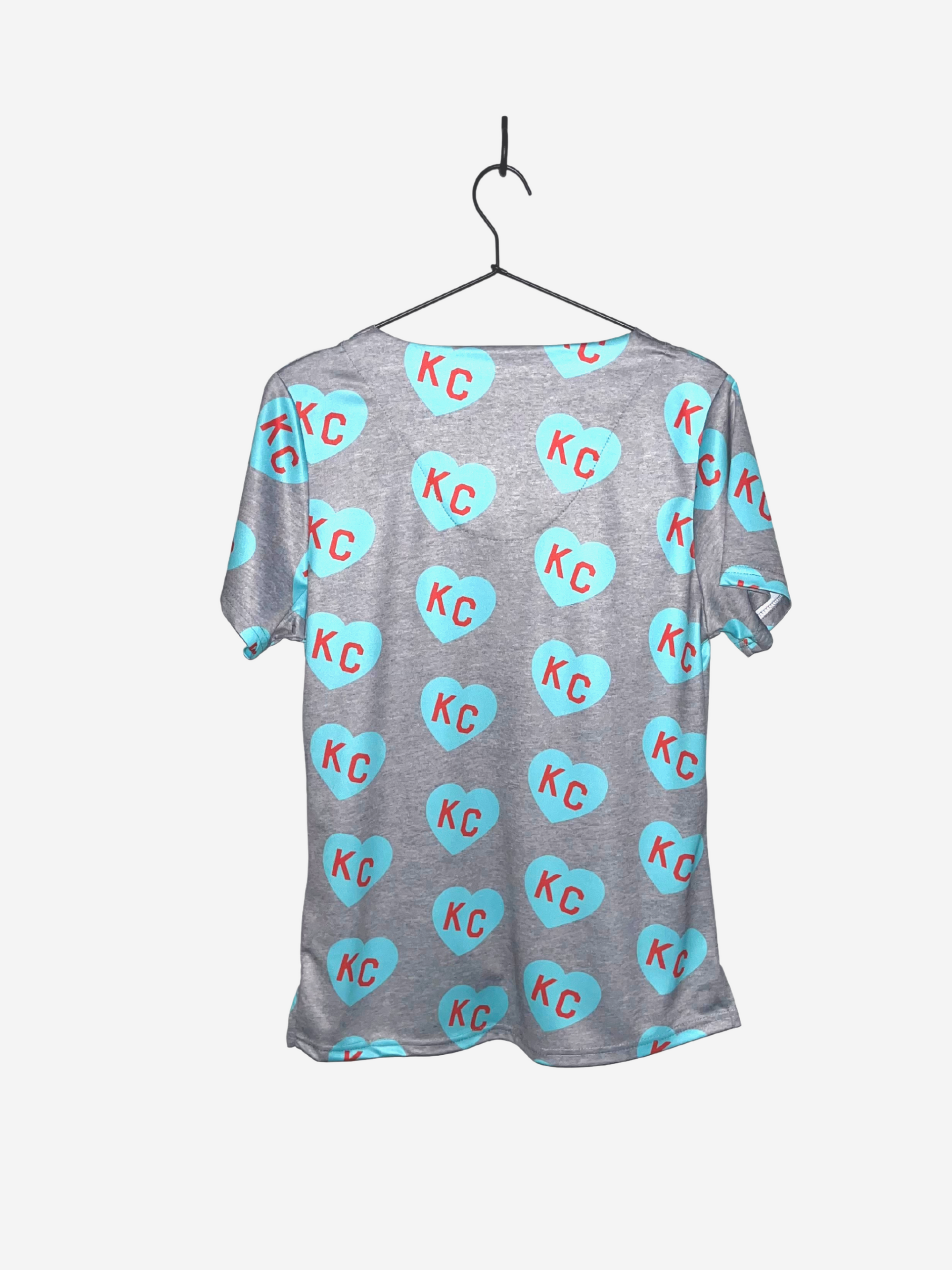 Women's Charlie Hustle Print Scrub Top in Turquoise and Red with 3 Pockets Back View