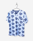 Men's Charlie Hustle Print Scrub Top with KC Heart All Over Pattern in Navy and Ceil with chest pocket