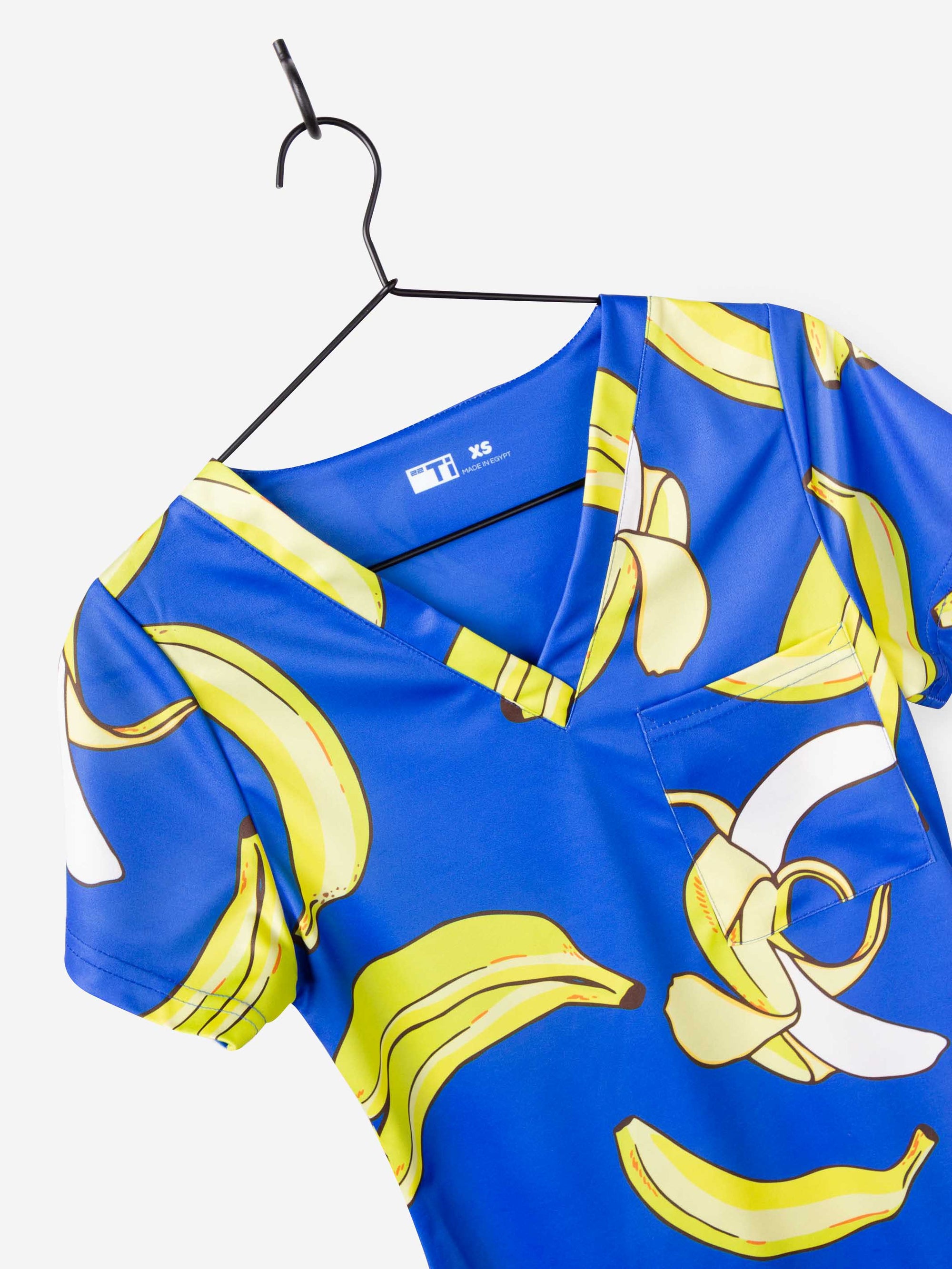 Women's Funny Banana Print Scrub Top Pattern in Royal Blue with chest pocket