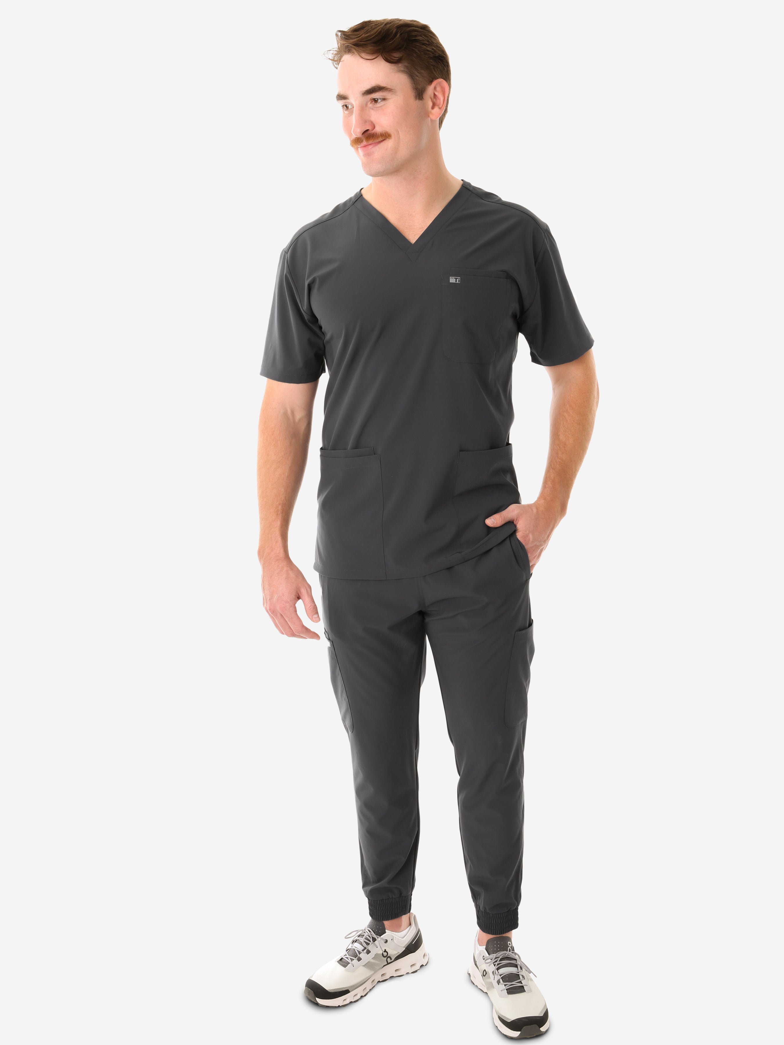 Men&#39;s Charocal Gray Five-Pocket Scrub Top Full Body Front View with Joggers