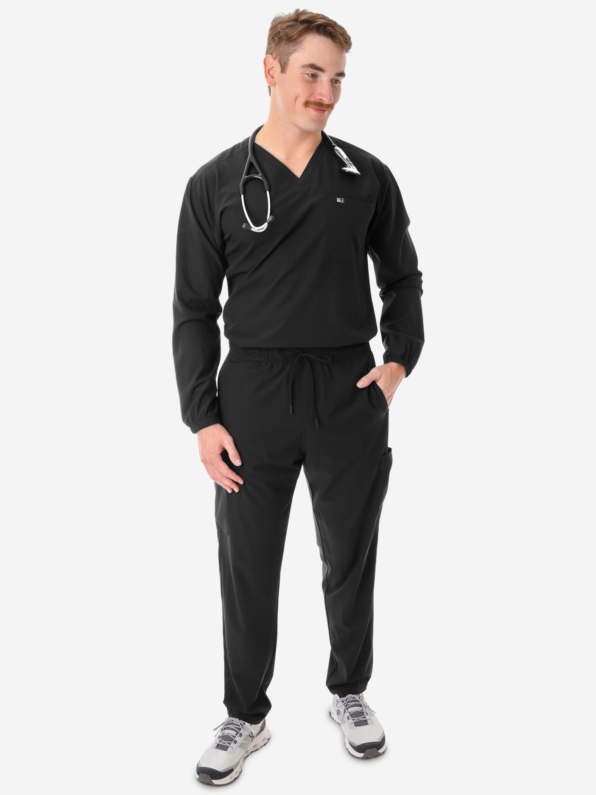 Men&#39;s Long Sleeve Scrub Top with Two Chest Pockets Real Black Full Body Front View with Stethoscope