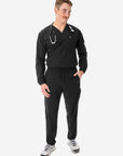 Men's Long Sleeve Scrub Top with Two Chest Pockets Real Black Full Body Front View with Stethoscope