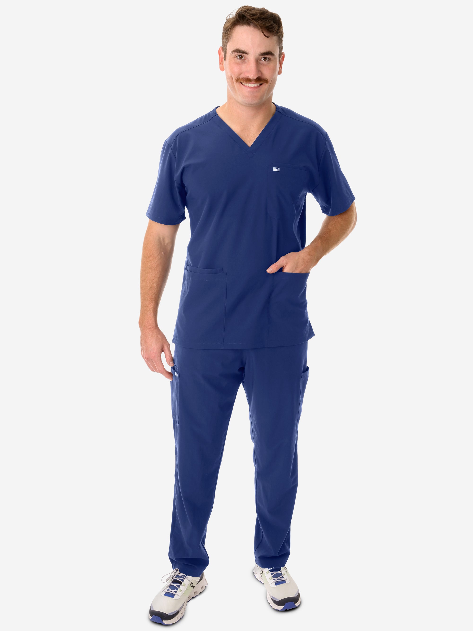 Men&#39;s Navy Blue Five-Pocket Scrub Top Full Body Front View with 9-Pocket Pants