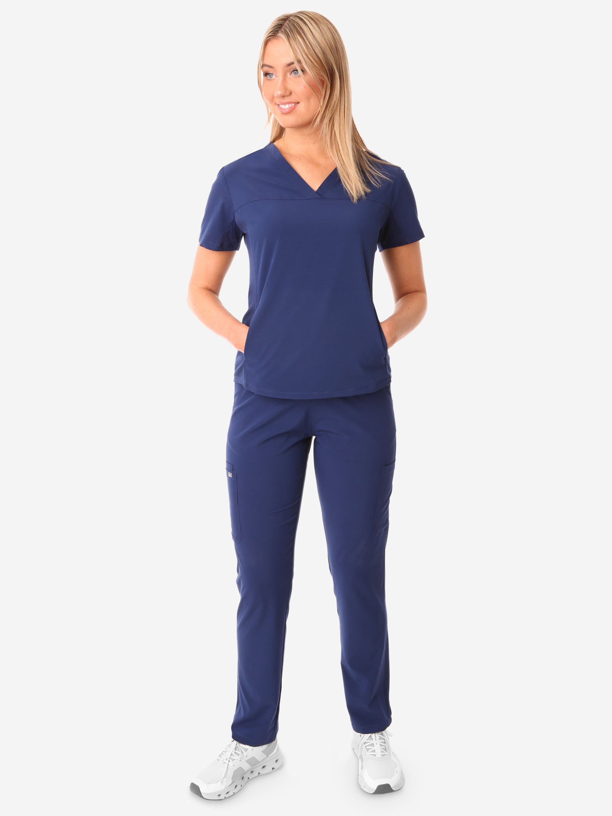 TiScrubs Stretch Women&#39;s Navy Blue Stash-Pocket Scrub Top + 9-Pocket Pants Full Body Front View