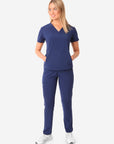 TiScrubs Stretch Women's Navy Blue Stash-Pocket Scrub Top + 9-Pocket Pants Full Body Front View