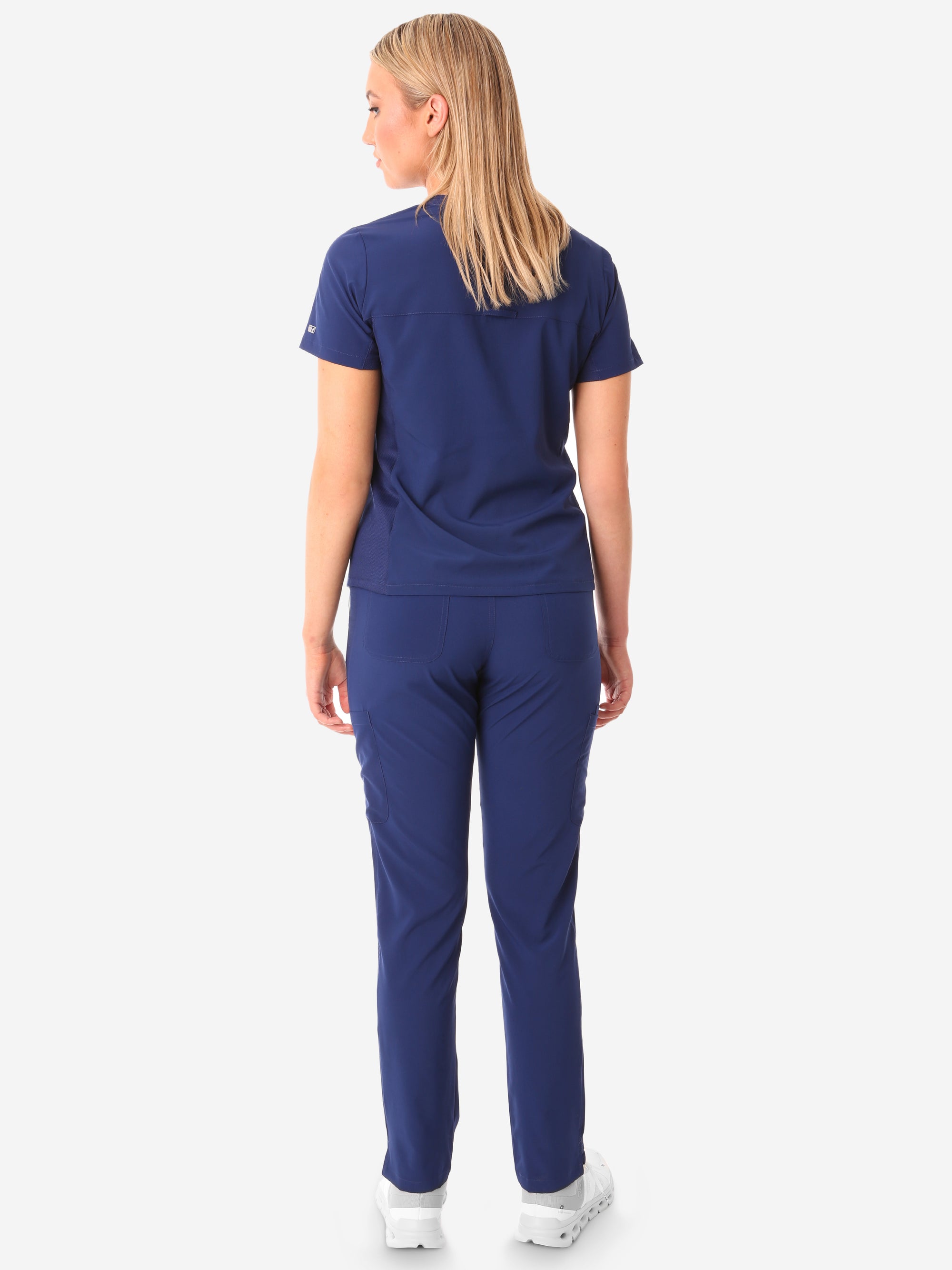 TiScrubs Stretch Women&#39;s Navy Blue Stash-Pocket Scrub Top + 9-Pocket Pants Full Body Back View