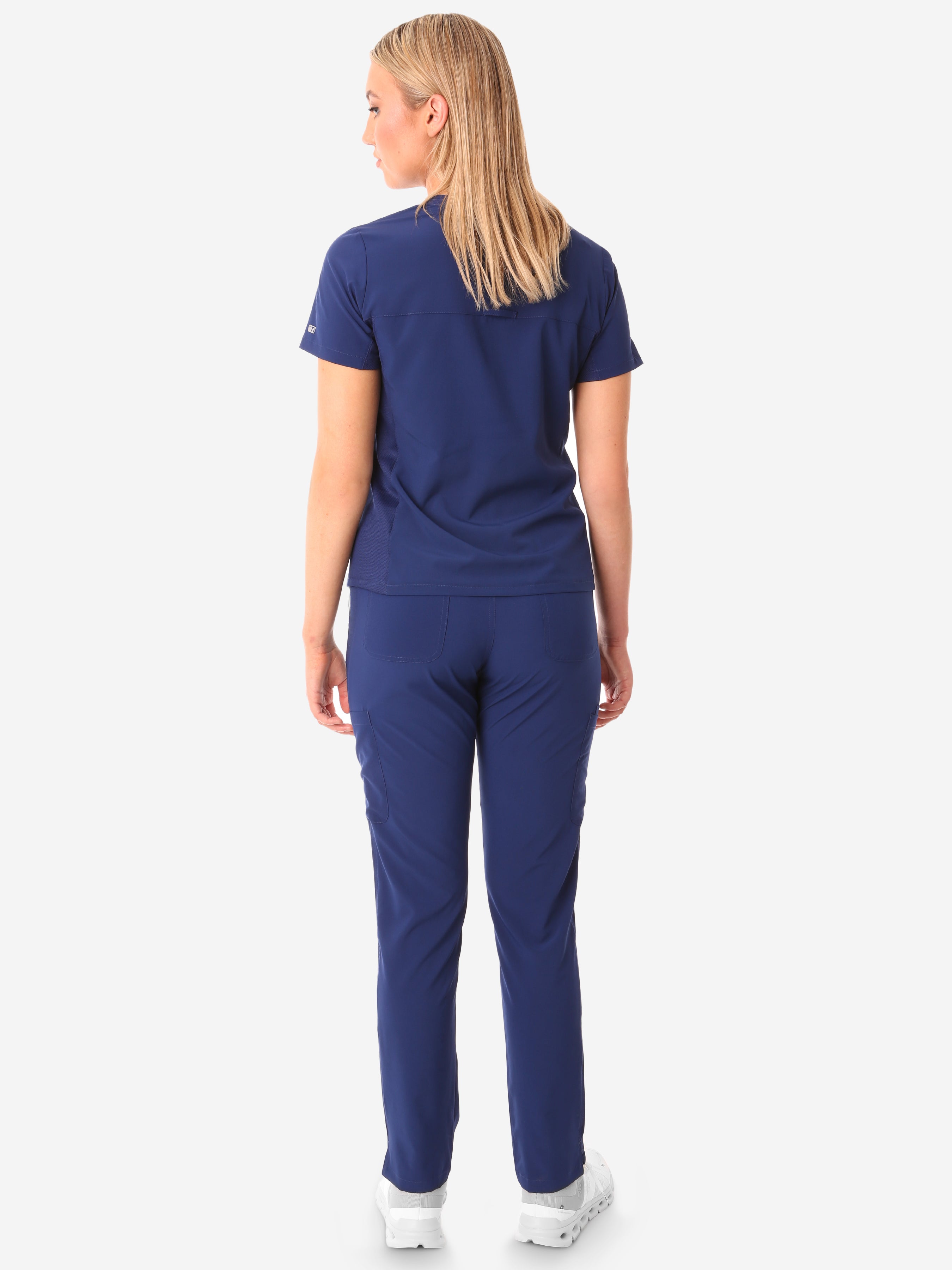 TiScrubs Stretch Women's Navy Blue Stash-Pocket Scrub Top + 9-Pocket Pants Full Body Back View