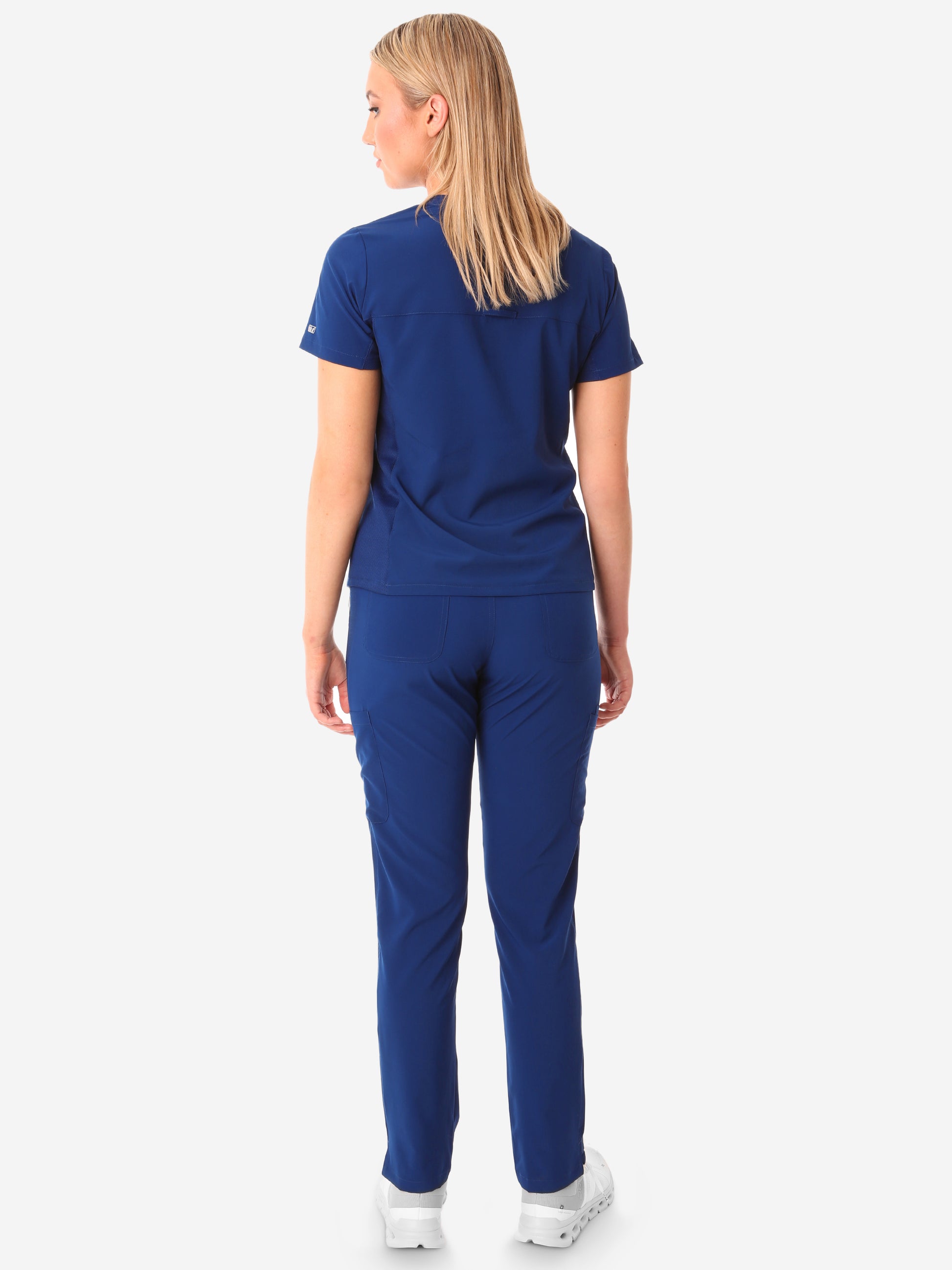 Women's Navy Blue Stash-Pocket Scrub Top Full Body Back with 9-Pocket Pants