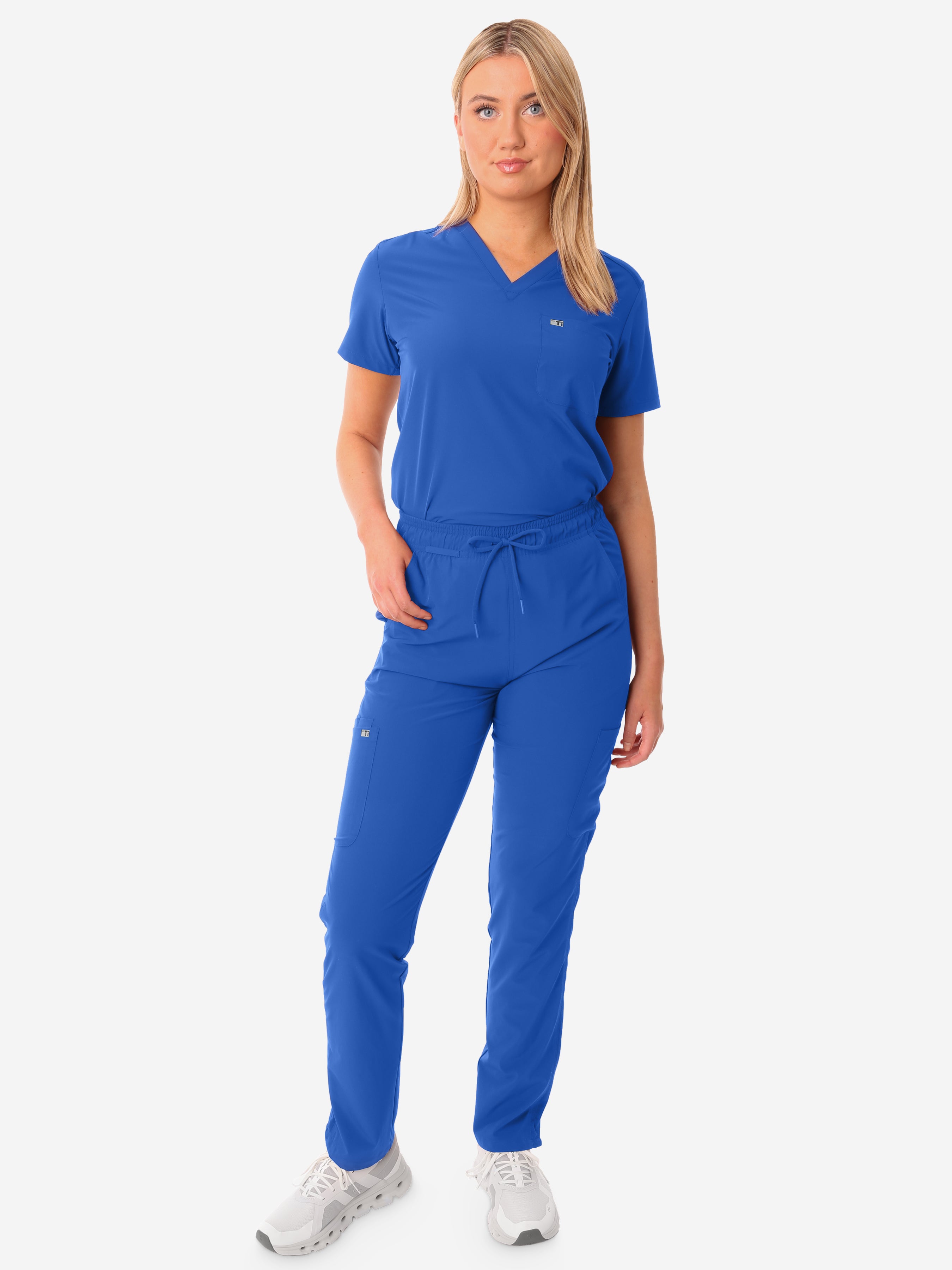 TiScrubs Royal Blue Women&#39;s Stretch 9-Pocket Pants and One-Pocket Tuckable Top Front View Full Body