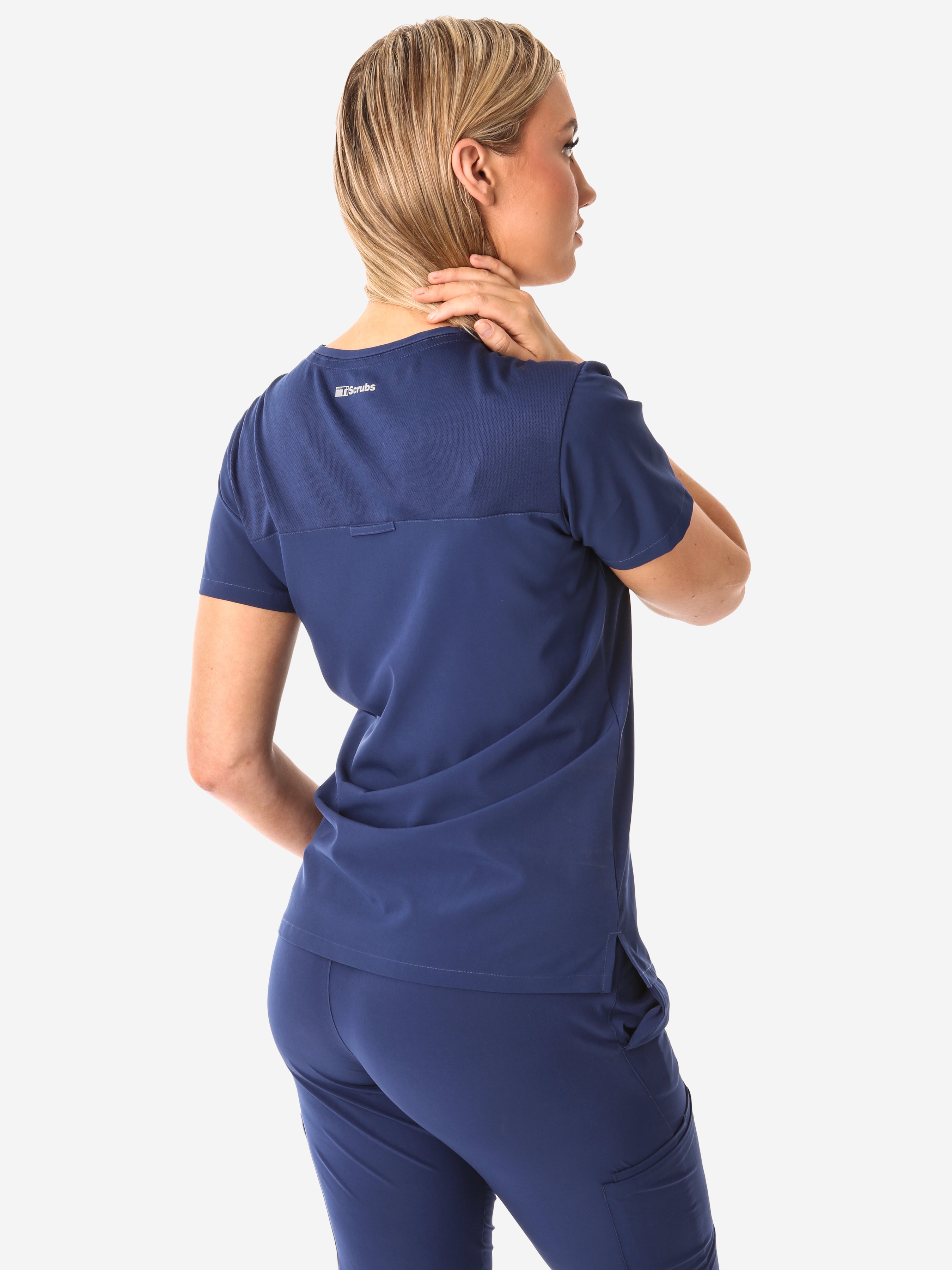 TiScrubs Women&#39;s Stretch Navy Blue Tuckable One-Pocket Scrub Top Untucked Back View Top Only