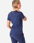 TiScrubs Women's Stretch Navy Blue Tuckable One-Pocket Scrub Top Untucked Back View Top Only