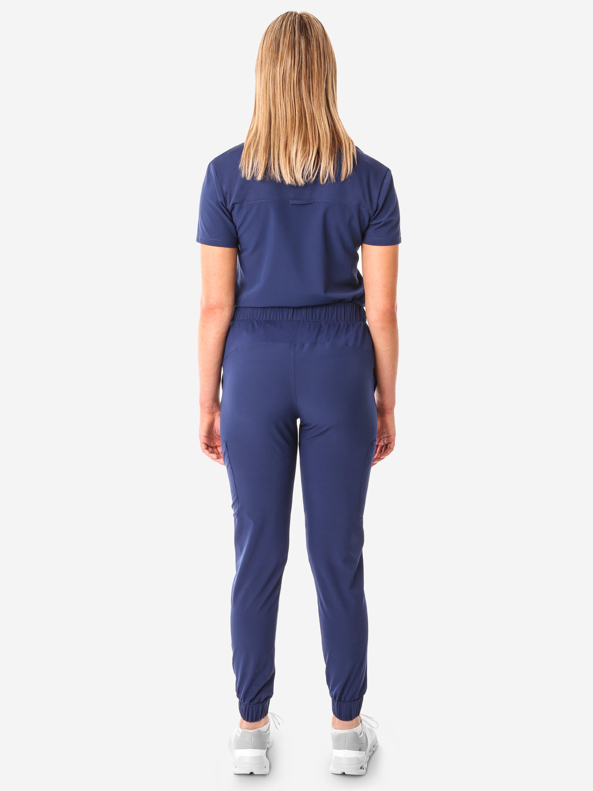 TiScrubs Navy Blue Women&#39;s Stretch Perfect Jogger Pants and One-Pocket Tuckable Top Back View Full Body