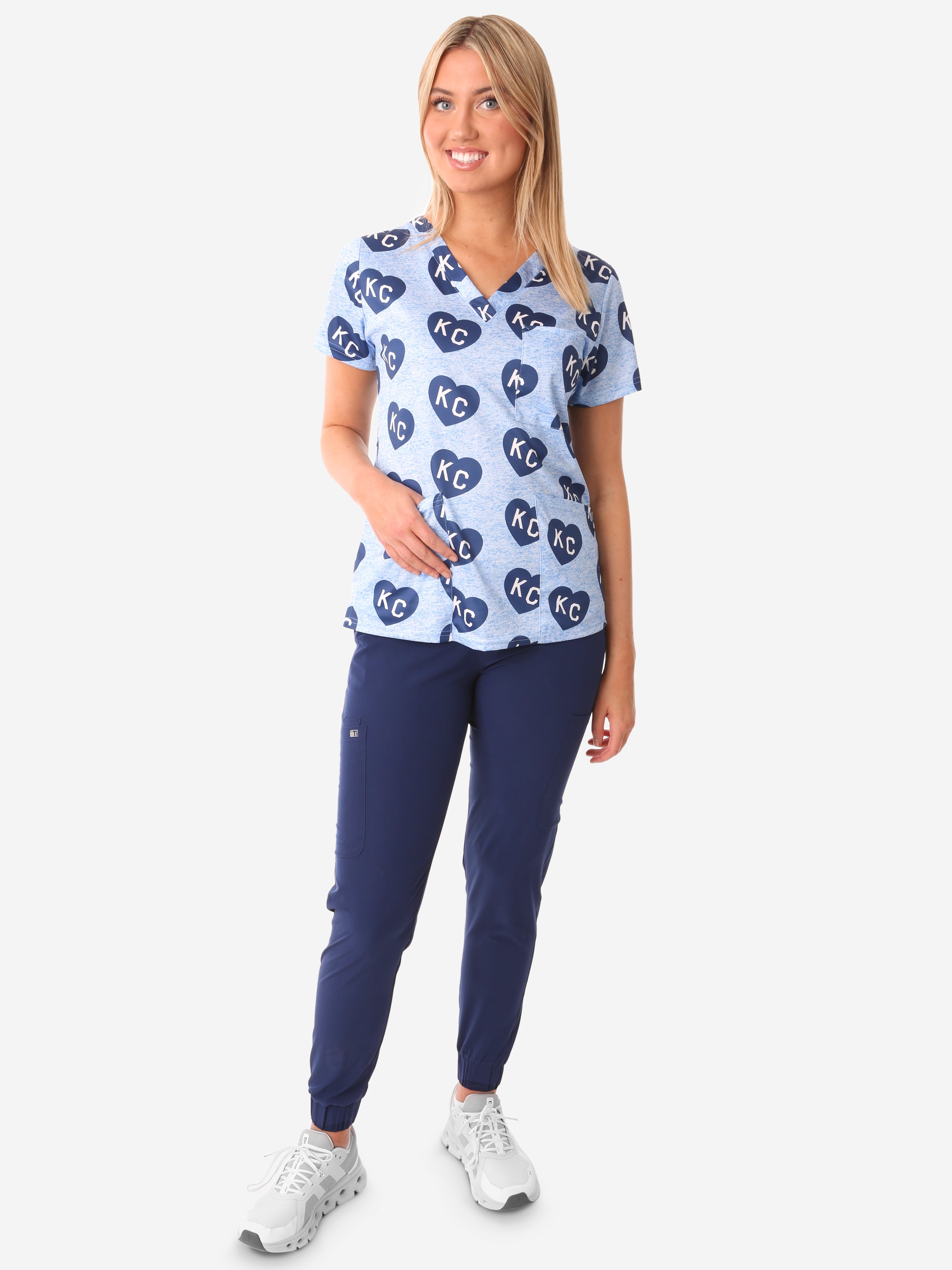 Women's Charlie Hustle Scrub Top All-Over KC Heart Design 3 Pockets with Navy Jogger Scrub Pants_Full Body_Front