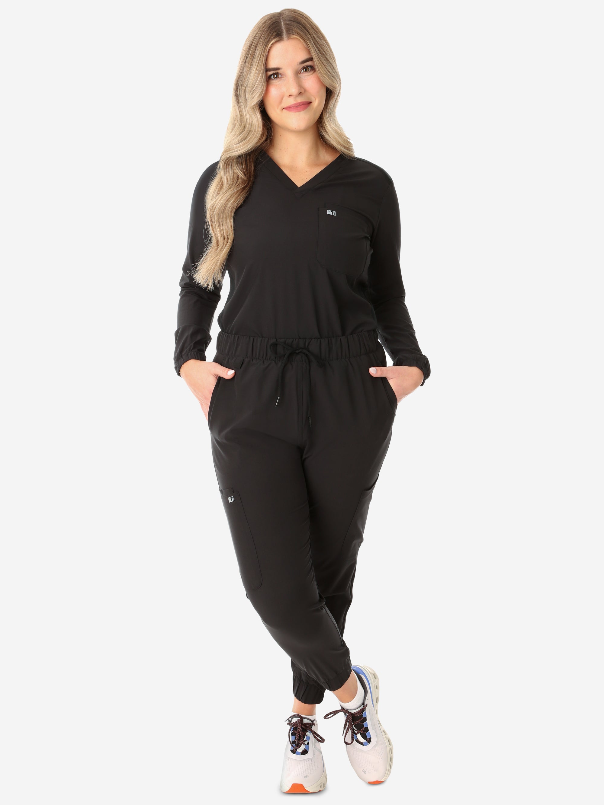 Women's Real Black Long-Sleeve Scrub Top Tucked with Perfect JoggersFront View Full Body