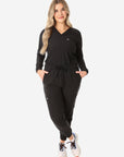 Women's Real Black Long-Sleeve Scrub Top Tucked with Perfect JoggersFront View Full Body