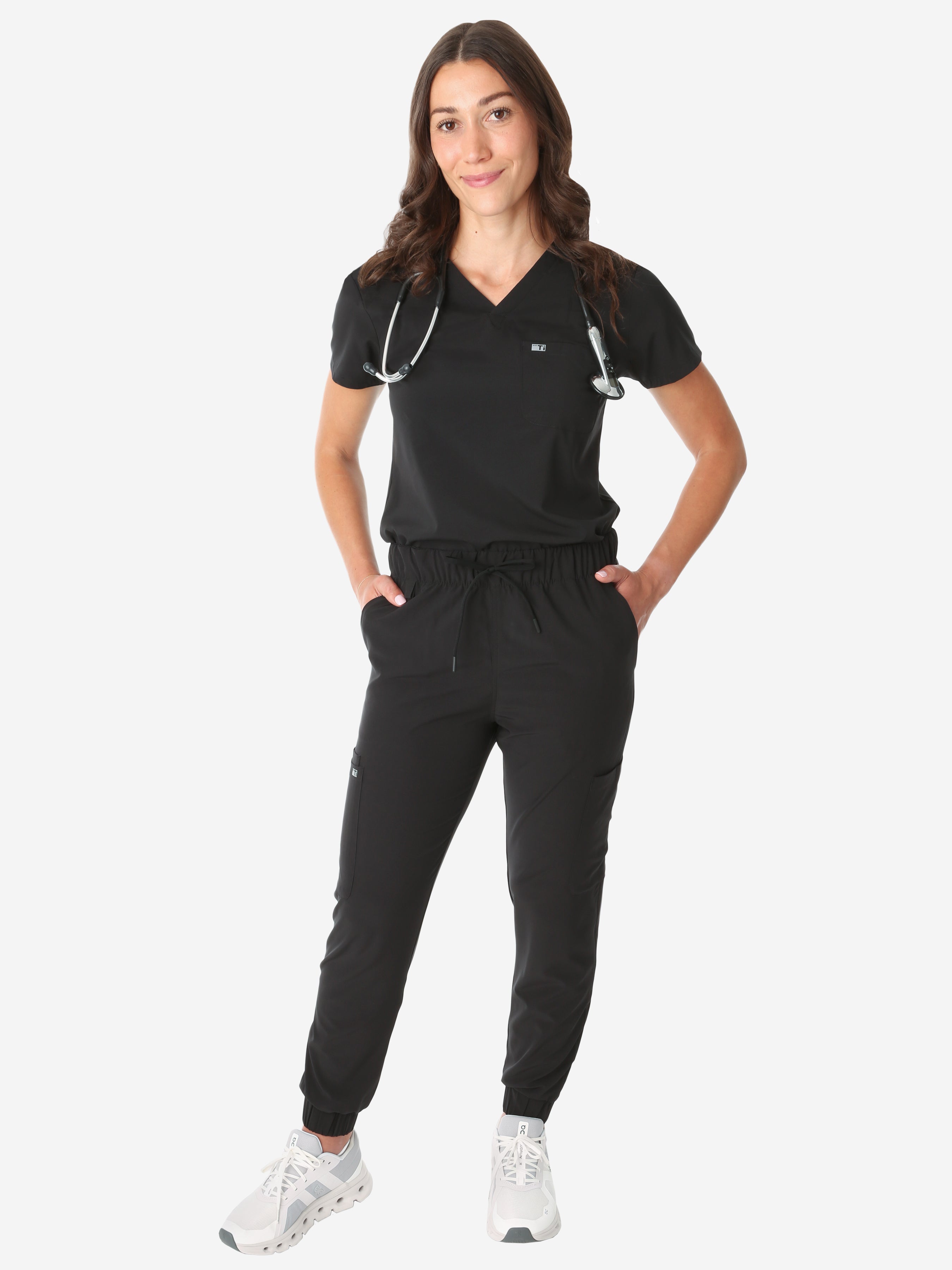 TiScrubs Women&#39;s Stretch One-Pocket Scrub Top with Joggers Real Black Tucked Front Full Body