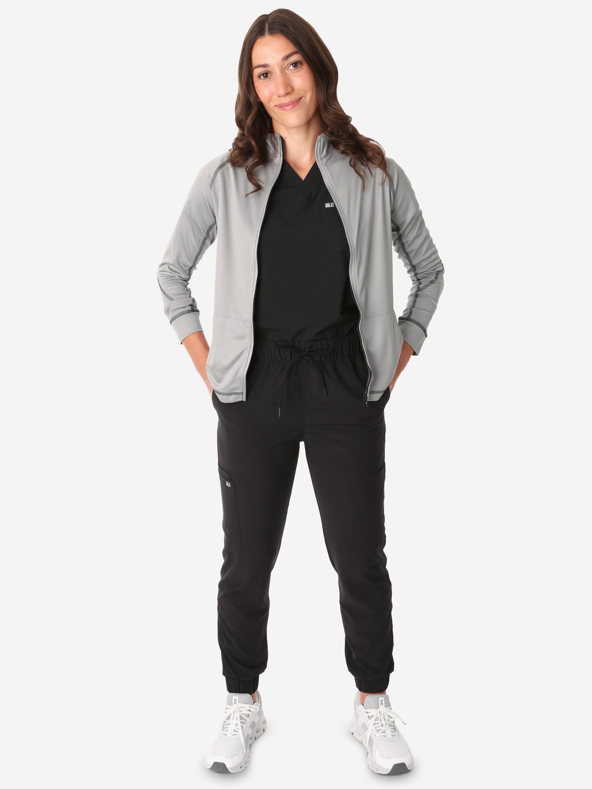 Women&#39;s Mesh Scrub Jacket Unzipped Titanium Gray Front View Full Body Plus Black Stretch Scrubs