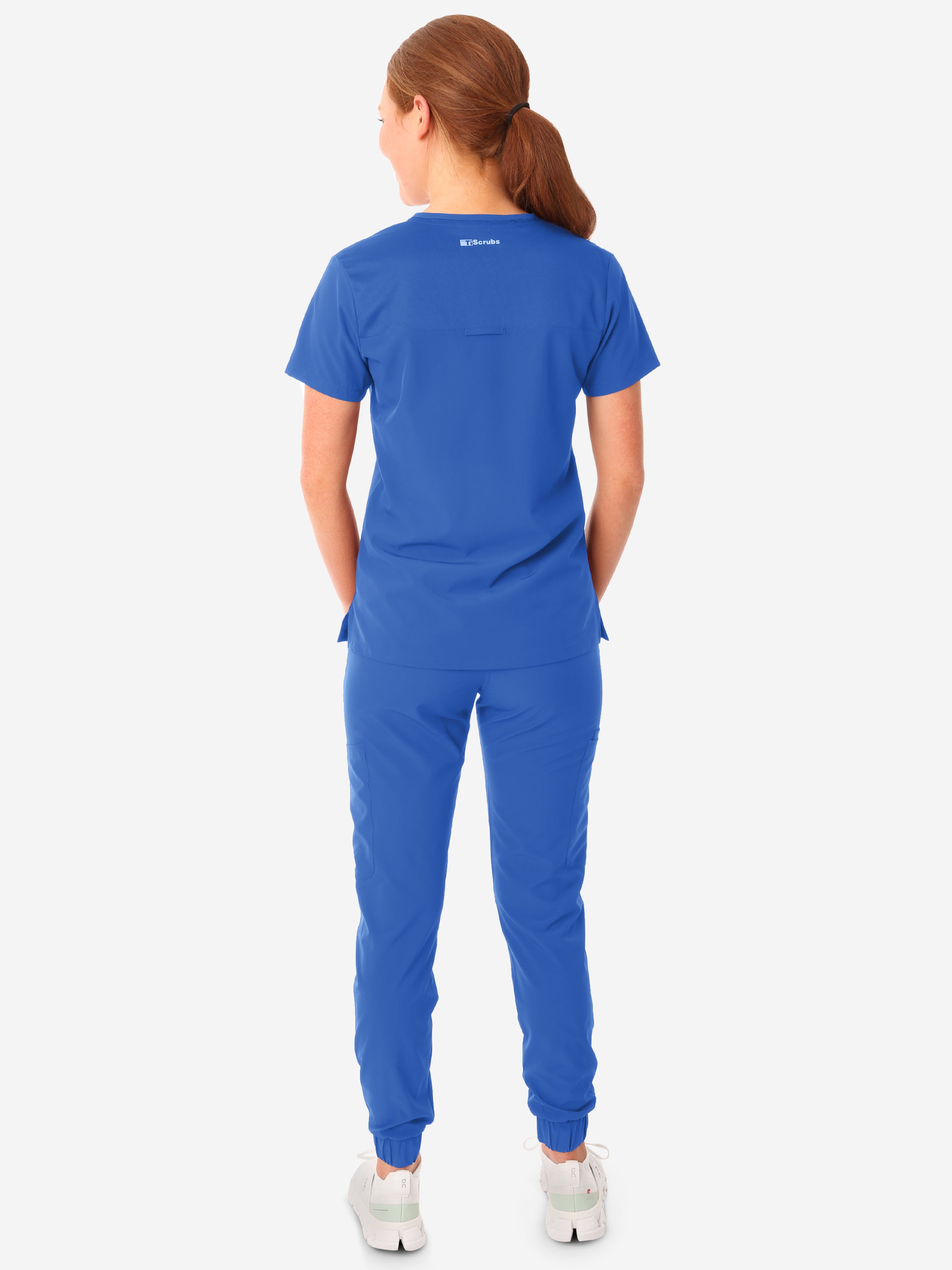 TiScrubs Women's Stretch Royal Blue One-Pocket Scrub Top Untucked with Joggers Back View Full Body