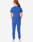 TiScrubs Women's Stretch Royal Blue One-Pocket Scrub Top Untucked with Joggers Back View Full Body