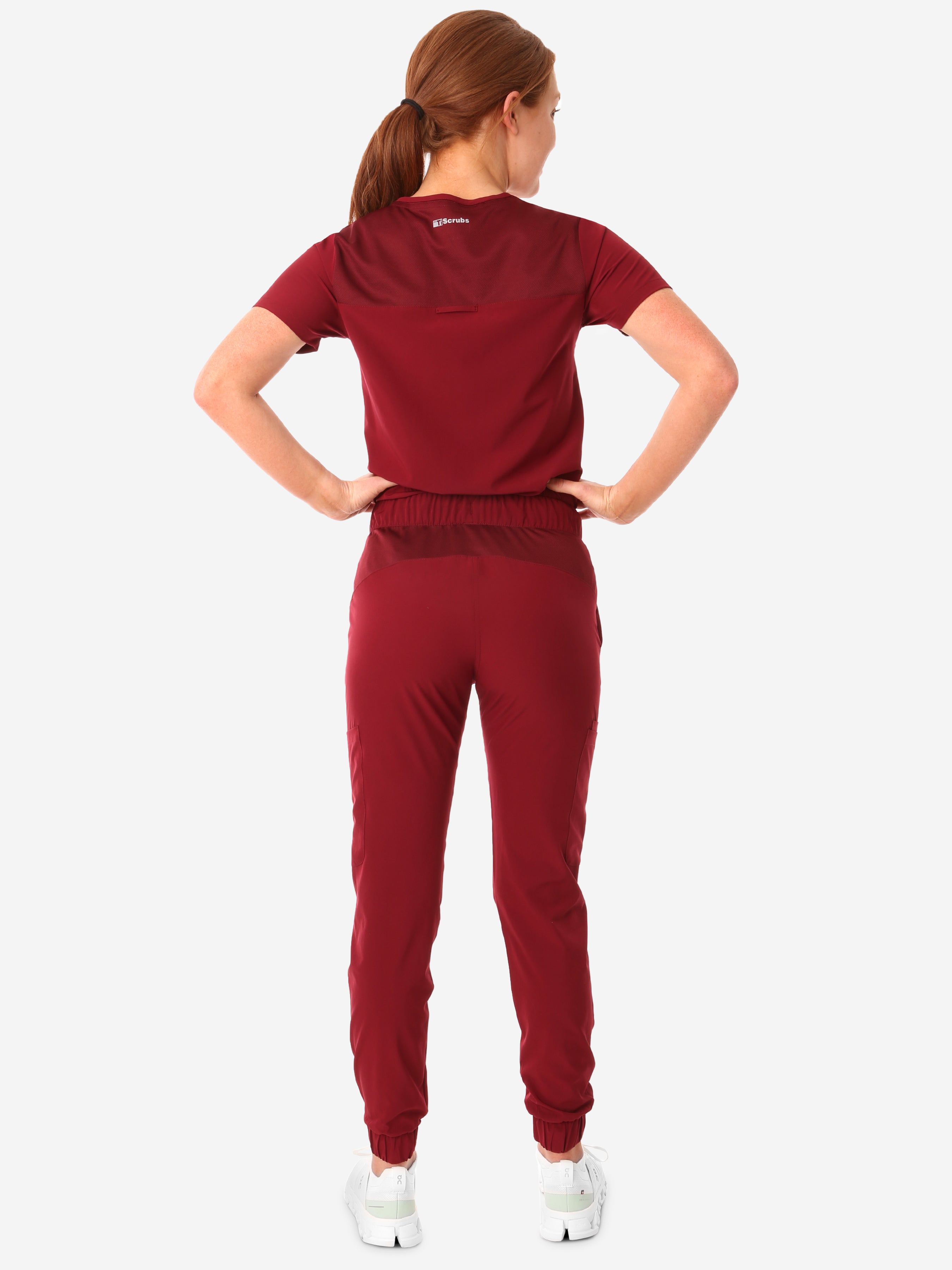 TiScrubs Bold Burgundy Women&#39;s Stretch Perfect Jogger Pants and One-Pocket Tuckable Top Back View Full Body