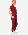 TiScrubs Bold Burgundy Women's Stretch Perfect Jogger Pants and One-Pocket Tuckable Top Side View Full Body