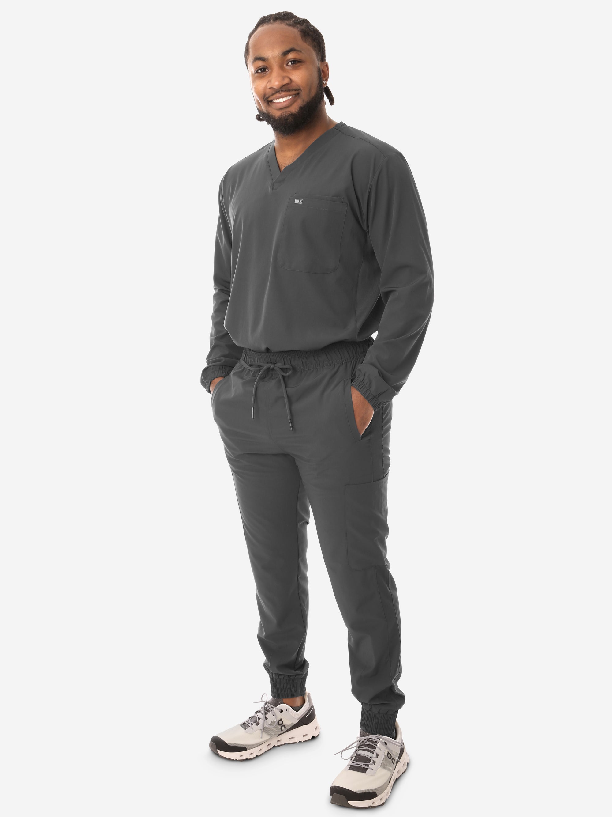 Men&#39;s Long Sleeve Scrub Top with Two Chest Pockets Charcoal Gray Full Body Front View with Jogger Scrub Pants