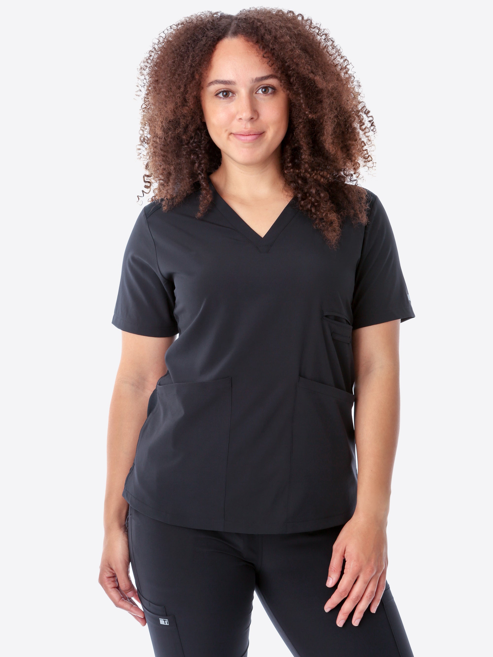 Women&#39;s Four-Pocket Scrub Top Real Black Top Only Front View