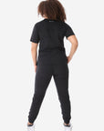 Women's Four-Pocket Scrub Top Real Black Top Full Body Back View with Joggers