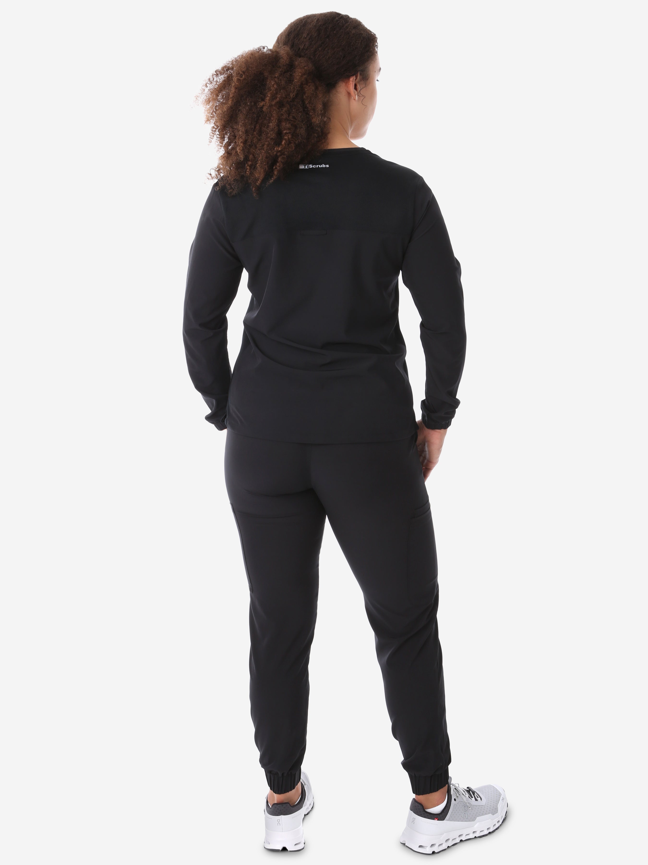 Women&#39;s Real Black Long-Sleeve Scrub Untucked Full Body Back View with Perfect Joggers