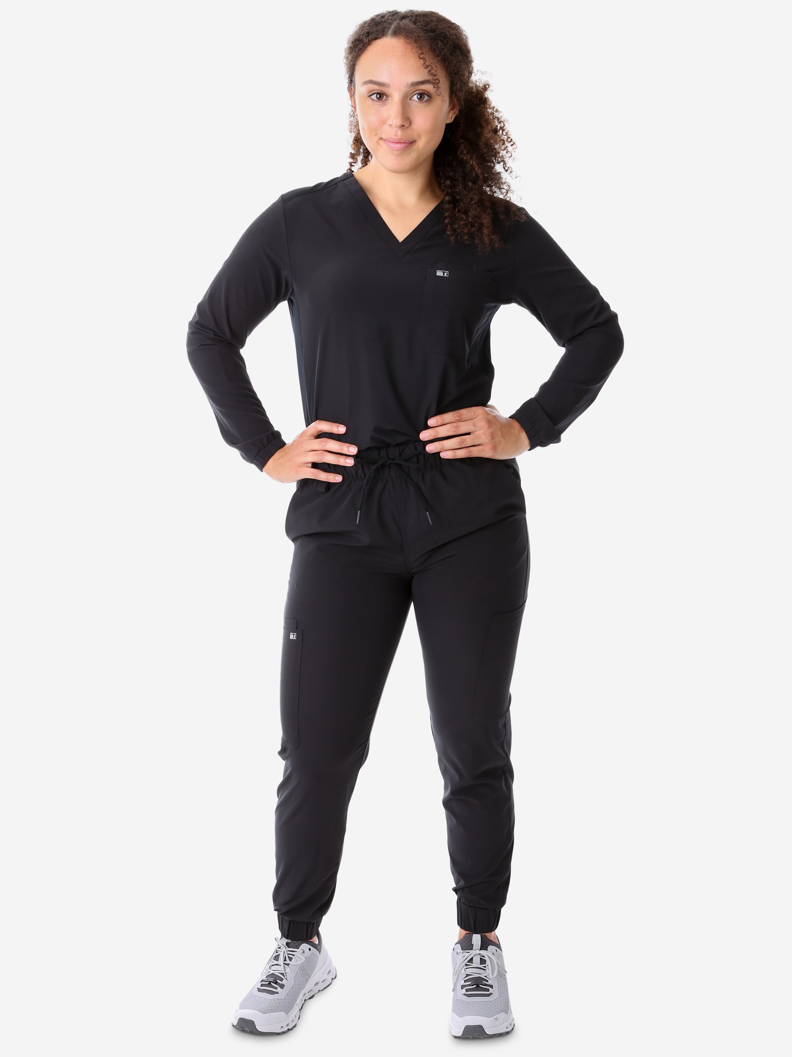 Women's Real Black Long-Sleeve Scrub Tucked Full Body Front View with Perfect Joggers