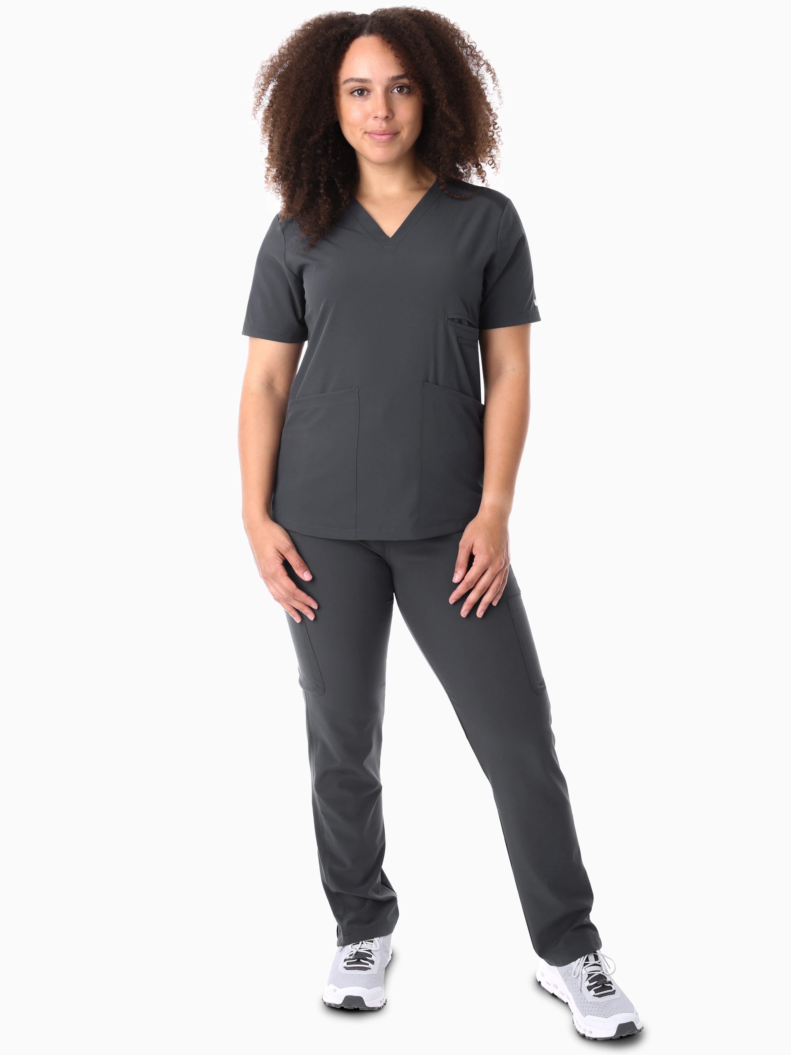 Women&#39;s Four-Pocket Scrub Top Charcoal Top Full Body Front View with 9-Pocket Pants