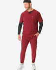 TiScrubs Stretch Men's Bold Burgundy Stretch Jogger Scrub Pants and Double-Pocket Top Untucked Long Sleeve Black Underscrub and Scrub Cap Full Body Front