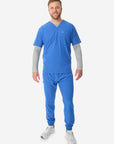 TiScrubs Titanium Gray Men's Mesh Long-Sleeve Underscrub Top Full Body Back with Royal Blue Scrub Joggers and Double-Pocket Top