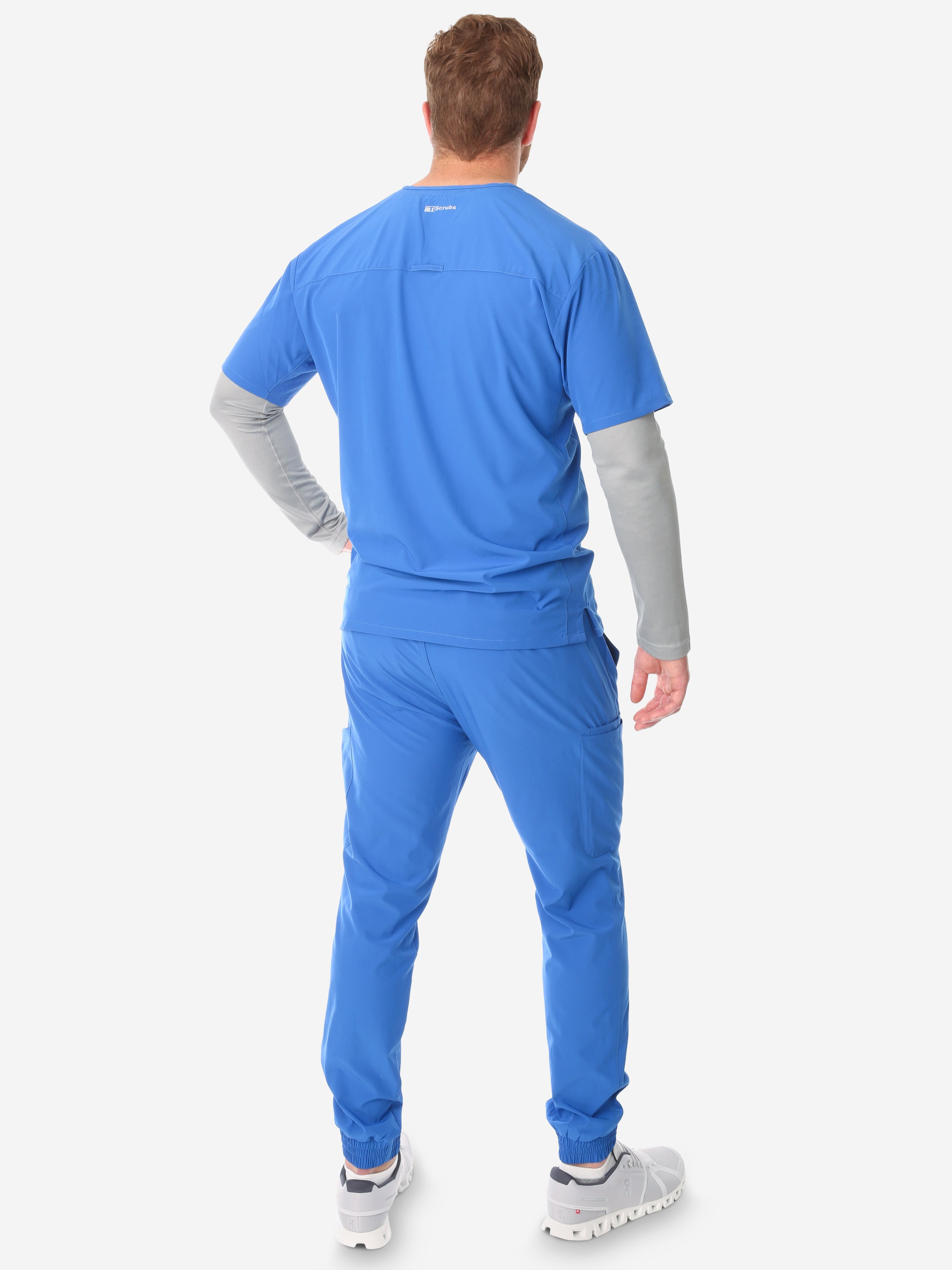 TiScrubs Men's Stretch Royal Blue Double-Pocket Scrub Top and Jogger Pants with Long-Sleeve Titanium Gray Underscrub Full Body Back
