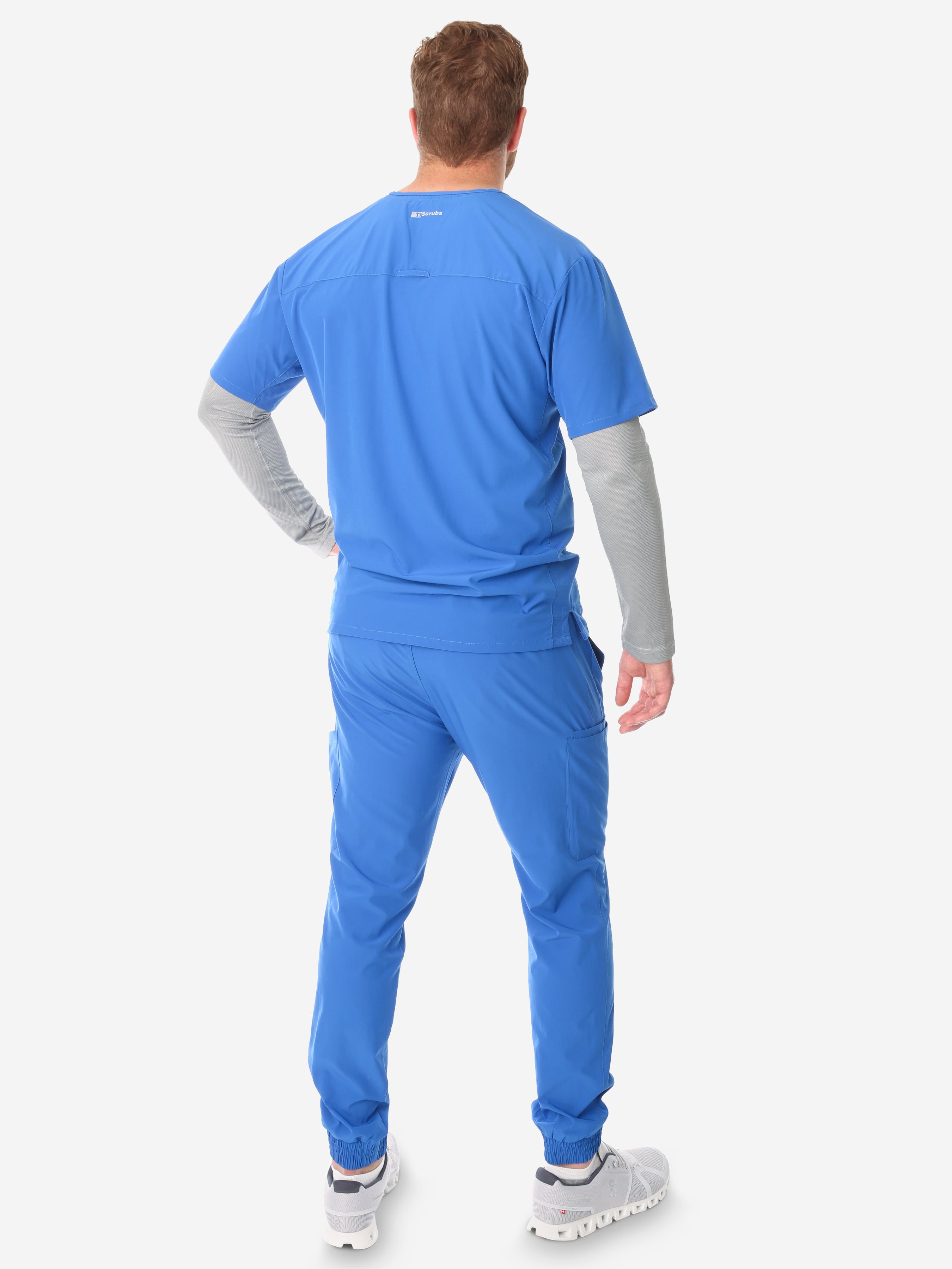 TiScrubs Titanium Gray Men&#39;s Mesh Long-Sleeve Underscrub Top Full Body Back with Royal Blue Scrubs