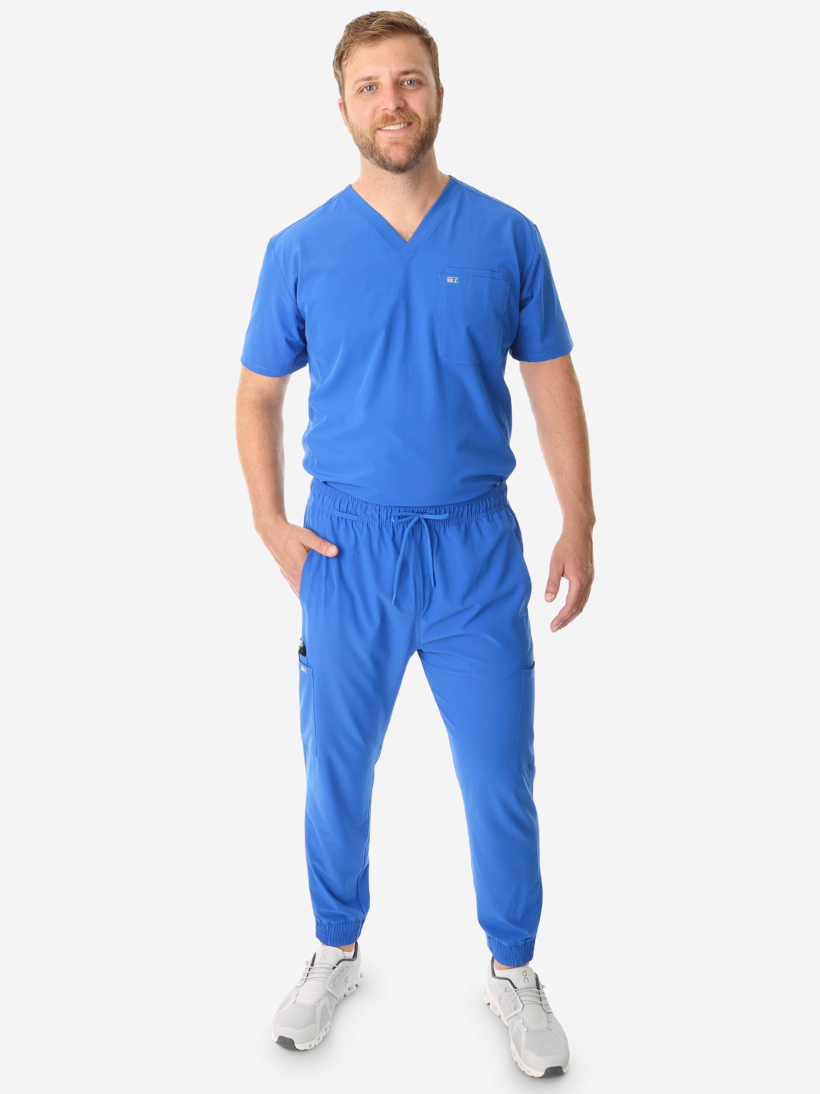 TiScrubs Men&#39;s Stretch Royal Blue Double-Pocket Scrub Top and Jogger Pants Full Body Front
